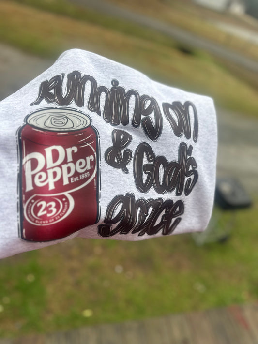 Running on Dr Pepper & God's Grace sweatshirt